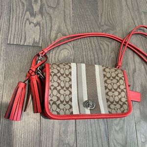 COACH cross body-signature canvas with coral accents